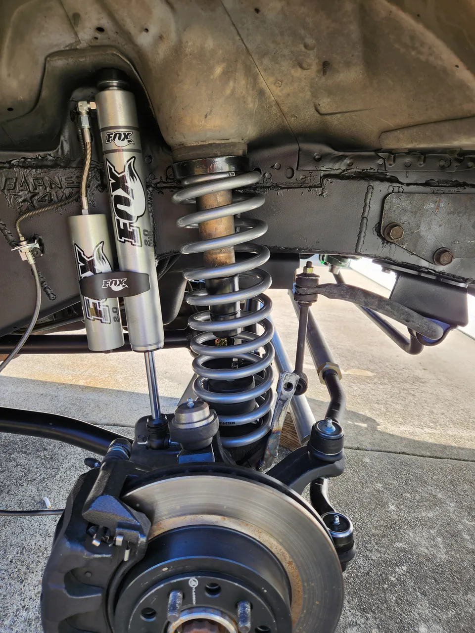 Fox shock and coil spring installed on a front suspension